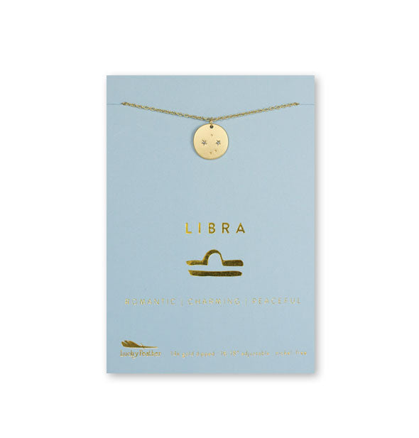 Gold Libra necklace on card with metallic gold print and symbol