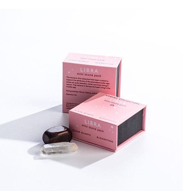 Two pink Libra Mini Stone Packs with crystals displayed in front.
