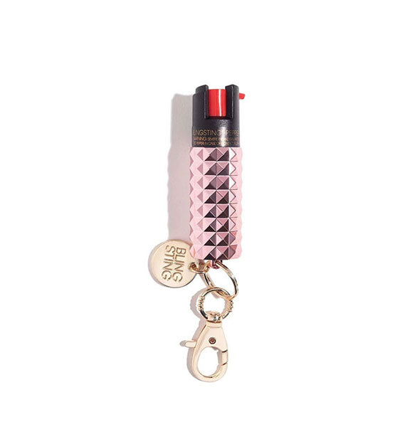 Light pink studded pepper spray canister with rose gold Blingsting tab and lobster clasp