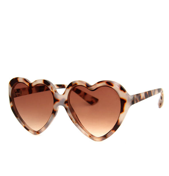 Heart-shaped sunglasses with light tortoise frame