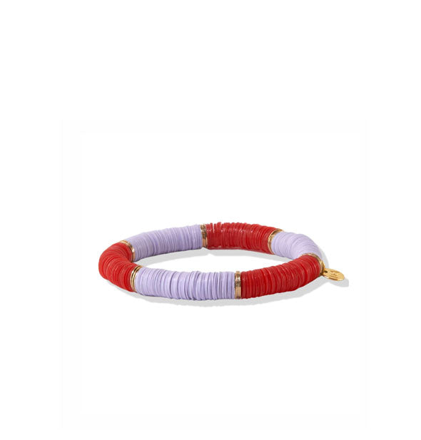 Bracelet with purple, red, and gold disc-like beads and gold charm