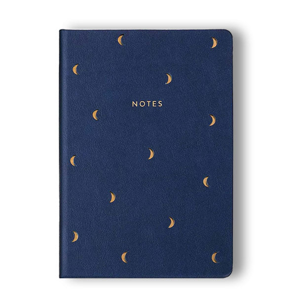 Navy blue journal cover with small gold crescent moon print says, "Notes" in metallic gold foil