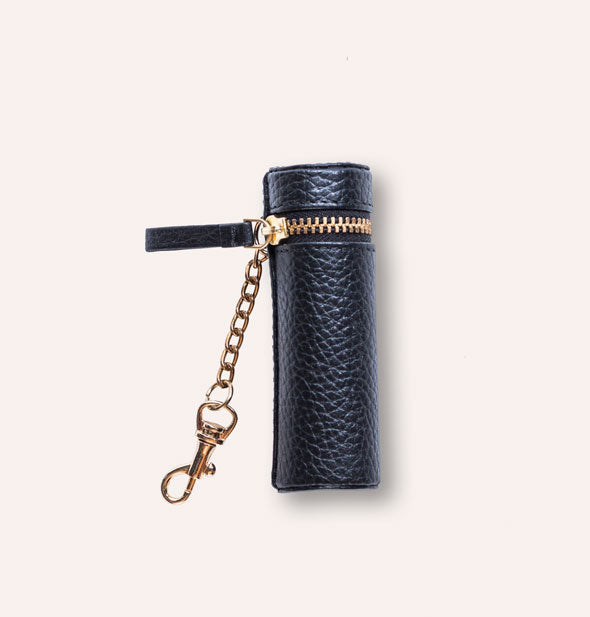 Pebbled black leather lipstick case with zipper pull tab and gold hardware