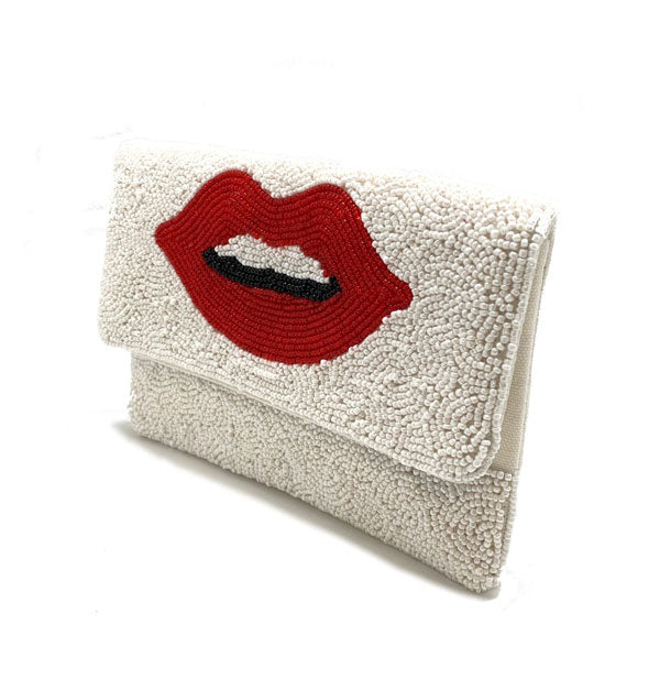 Rectangular white beaded purse with central red lips design