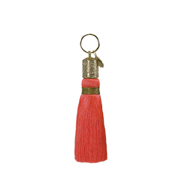 Pink coral tassel keychain with decorative gold hardware