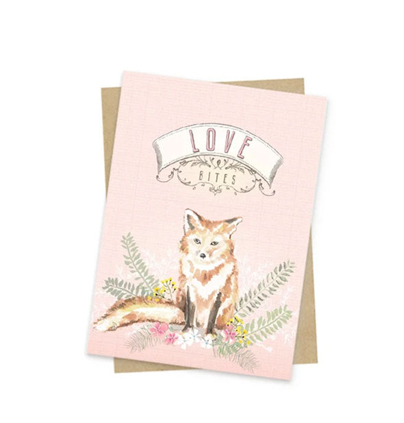 Light pink greeting card with illustration of a fox says, "Love bites" at the top in a decorative banner