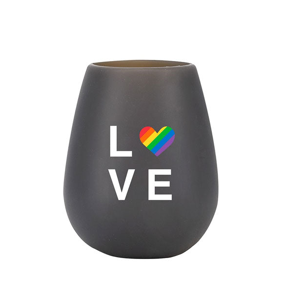 Black stemless silicone wine glass says, "LOVE" in white lettering with a rainbow striped heart in place of the O