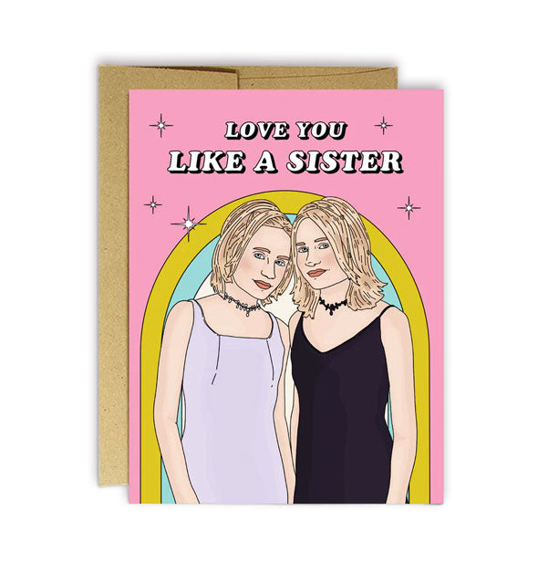 Pink greeting card with kraft envelope features illustration of Mary-Kate and Ashley Olsen under the words, "Love you like a sister"