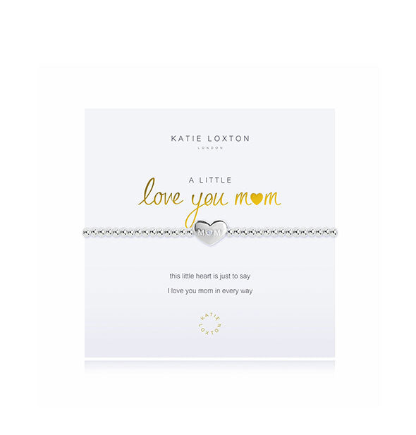 Silver toned Love You Mom bracelet with heart charm on white card with gold details