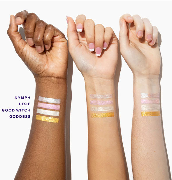 Three models' arms with different skin tones each have four stripes of Unicorn Snot Lightning Drops applied to show coverage and pigment: Nymph, Pixie, Good Witch, and Goddess