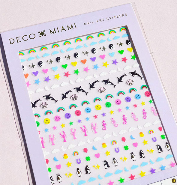Pack of Deco Miami Nail Art Stickers with marine, rainbow, star, and other designs shown