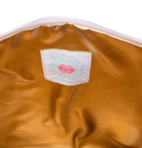 Pouch interior with metallic gold lining and sewn-in Papaya label