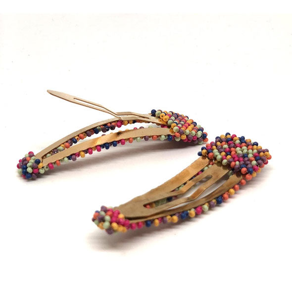 Multicolored beaded hair clips with brass snap backings