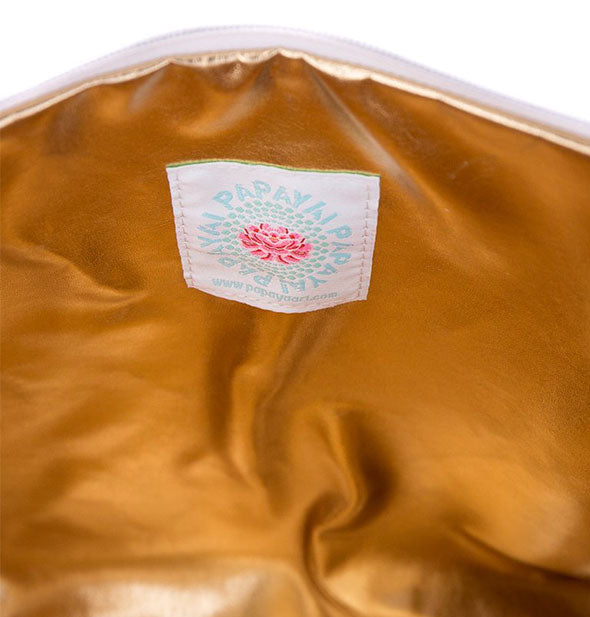 Metallic gold pouch interior with sewn-in Papaya label