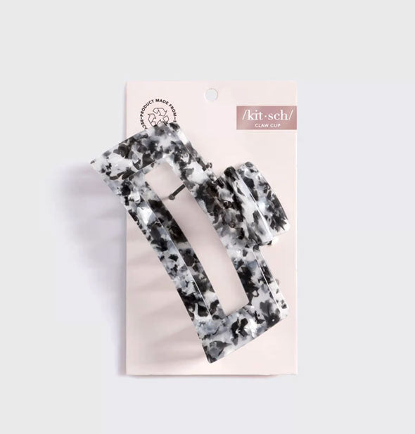 Black and white marbled claw clip by Kitsch on pink product card