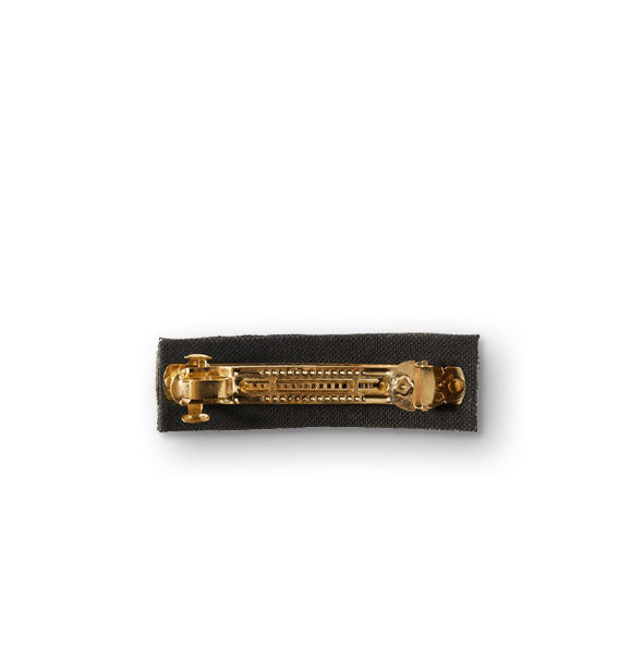 Back side of rectangular hair barrette shows gold-toned hardware