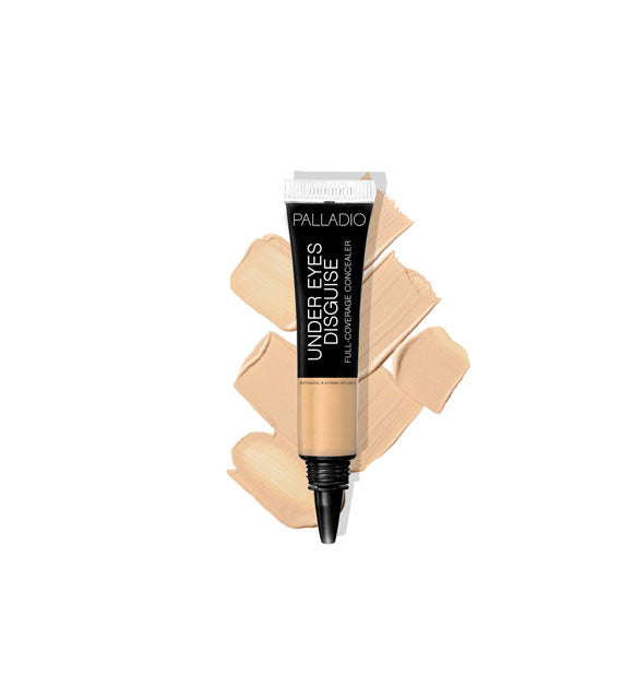Tube of Palladio Under Eyes Disguise concealer with product sample applications behind