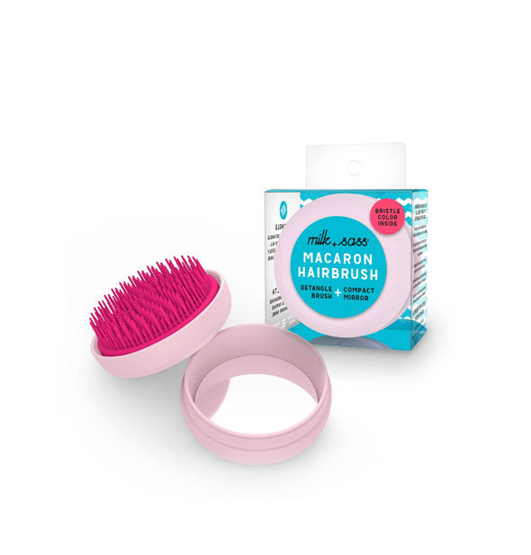 Two-tone pink mirrored Milk + Sass Macaron Hairbrush shown in and out of packaging