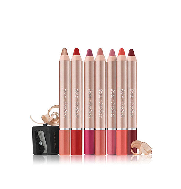 Grouping of Jane Iredale lip color pencils with sharpener and shavings