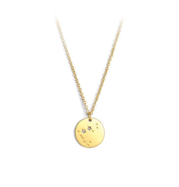Gold necklace with round stamped astrological sign pendant accented with two small crystals
