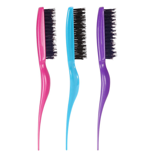 Three teasing brushes in pink, blue, and purple with black bristles