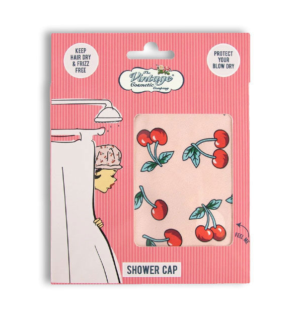 Packaging for The Vintage Cosmetic Company shower cap with cherry print shown through window