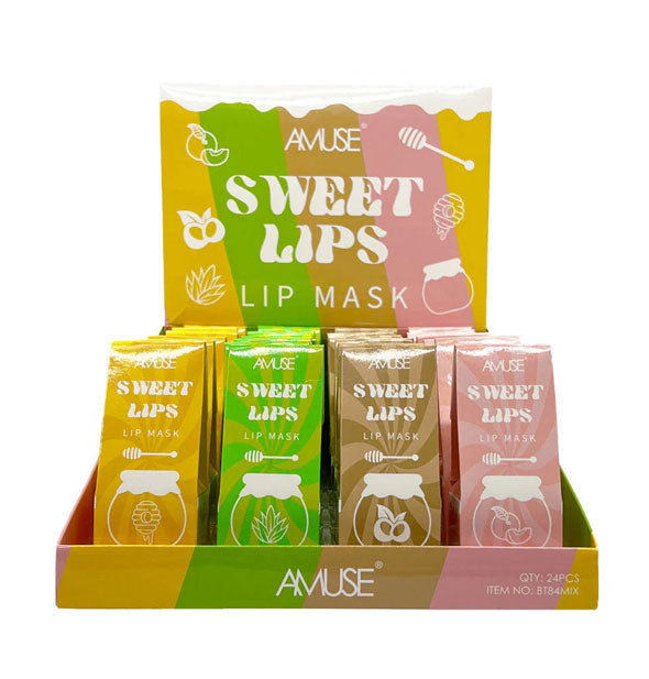 Store display of Amuse brand Sweet Lips Lip Masks in four scent/flavor varieties represented by gold, green, brown, and pink