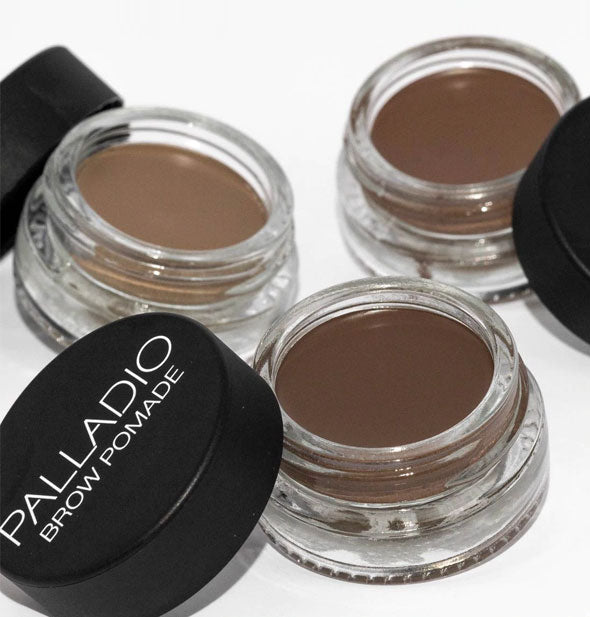 Three brown shades of Palladio Brow Pomade with lids removed