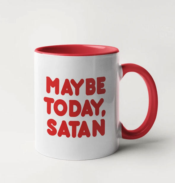 White coffee mug with red interior, handle, and lettering that says, "Maybe Today, Satan"