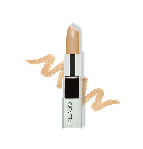 Stick of Palladio concealer in a medium shade with sample squiggle drawn behind