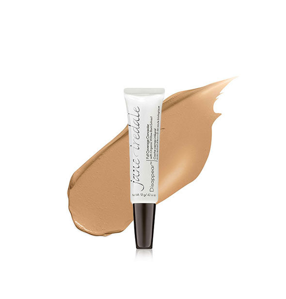 Tube of Jane Iredale Disappear Full Coverage Concealer with color swatch behind in the shade Medium Dark