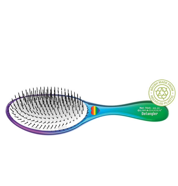 Olivia Garden Detangler hairbrush with purple-blue-green ombre coloring and a rainbow heart logo at center features a recycled materials badge
