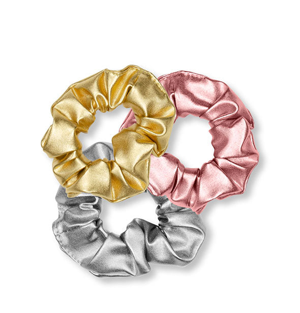 Set of three metallic hair scrunchies in gold, pink, and silver