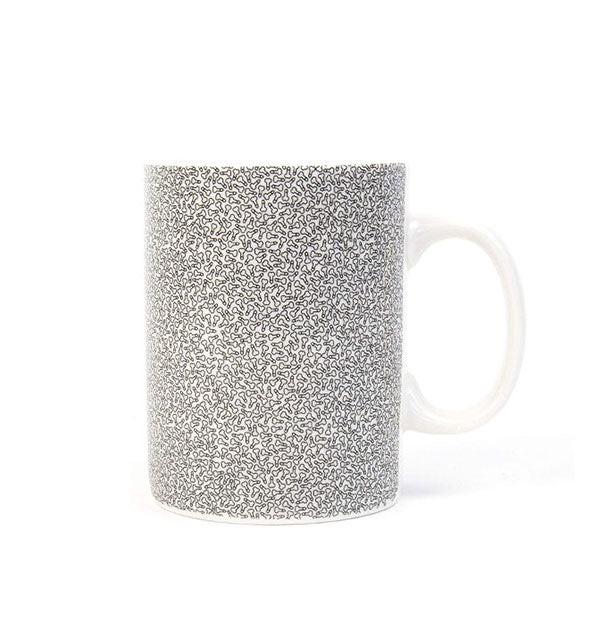 White coffee mug with all-over miniature phallus illustrations