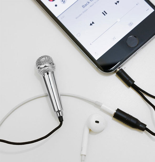 Mini Karaoke Microphone plugged into smartphone