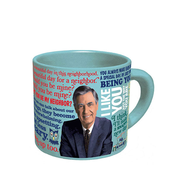 Light blue coffee mug with image of Mister Rogers wearing a blue jacket and surrounded by quotes of his in different colors and typefaces