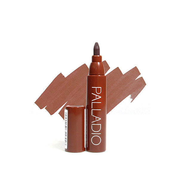 Brown Palladio lip stain pen with cap removed and sample color swatch drawn behind