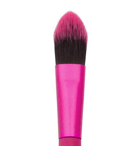 Closeup of pink makeup brush head with two-tone bristles in a soft point shape