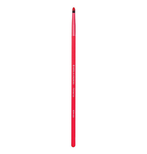 Long slender red makeup brush