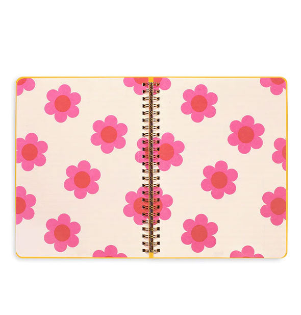 Journal interior features a pink and red mod-style flower print across two white pages