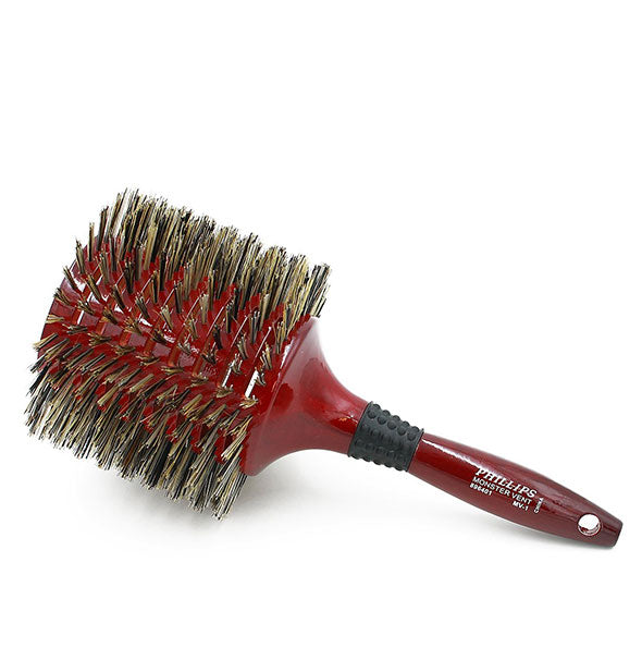 Reddish wooden Phillips hairbrush with rubberized black partial grip and extra-large barrel