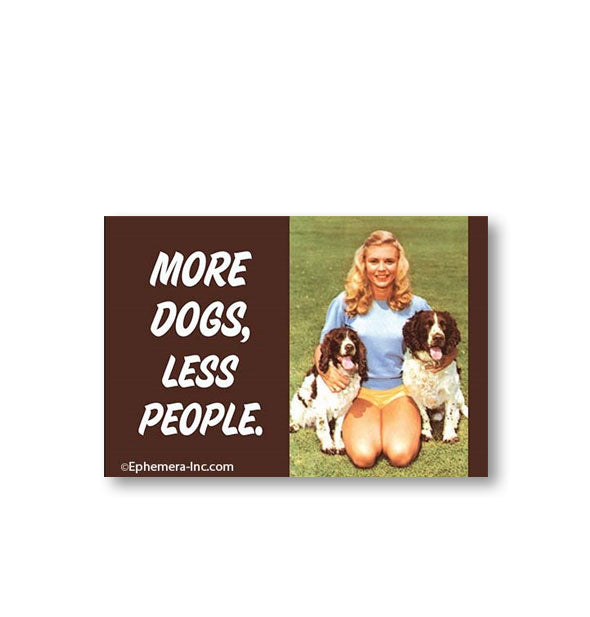 Rectangular magnet by Ephemera Inc. with image of a woman kneeling with two Springer Spaniels says, "More dogs, less people."