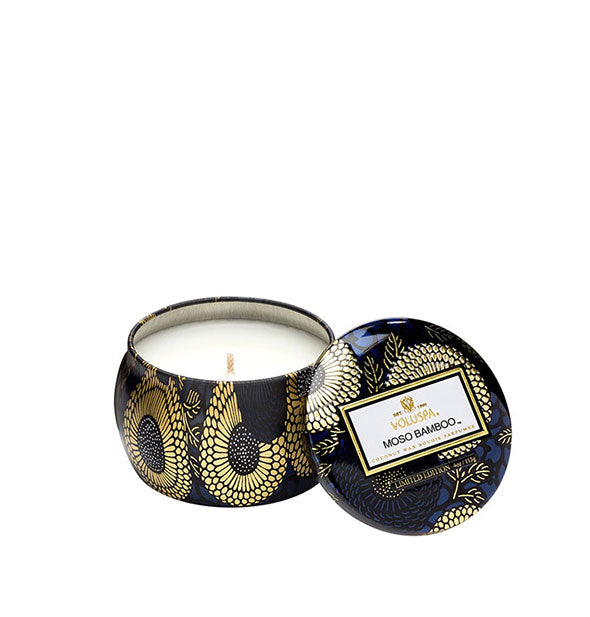 Black and gold metallic Moso Bamboo Voluspa candle tin with lid removed