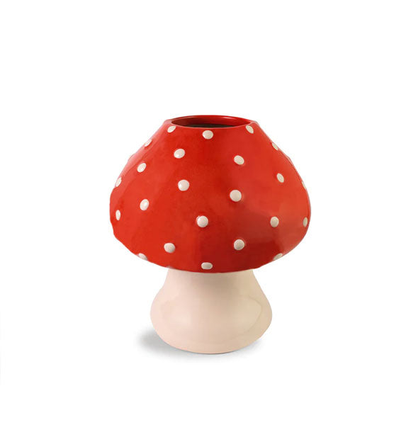 Mushroom vase with white base and red top accented with small white polkadots