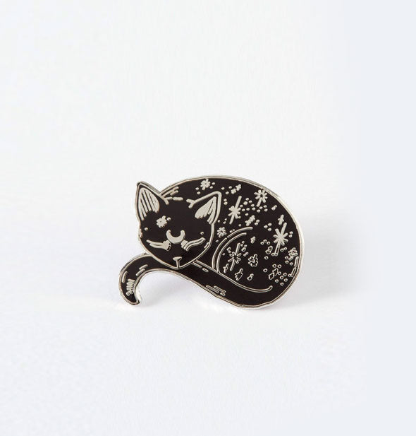 Black enamel cat pin with celestial accents