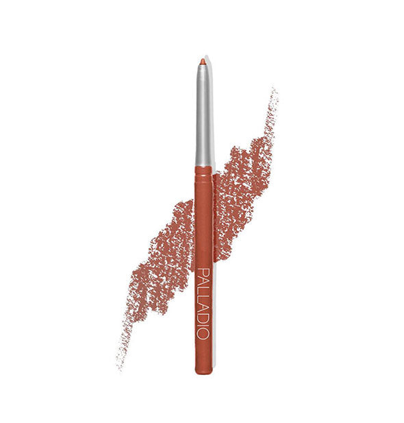 Retractable Palladio liner pencil with sample drawing behind in a muted peachy-coral shade