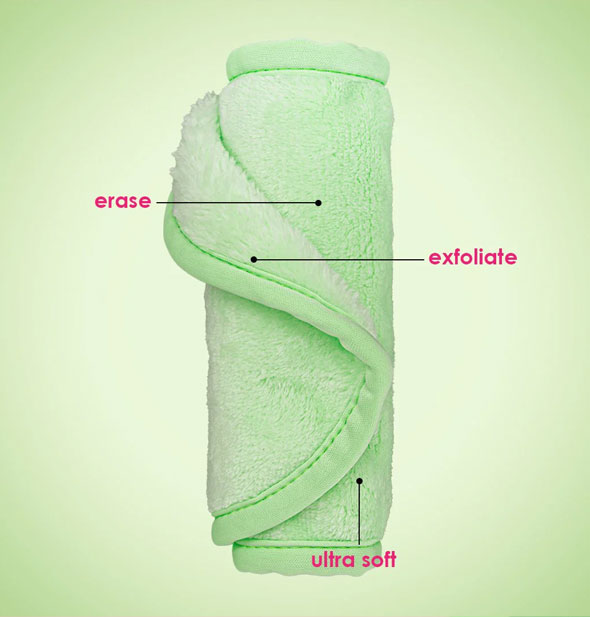 Rolled up green MakeUp Eraser is labeled, Erase, Exfoliate, Ultra Soft