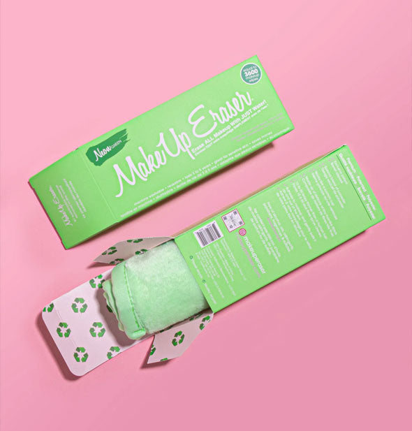 Two Neon Green MakeUp Eraser boxes, one closed and the other opened with rolled up cloth partially emerging from it