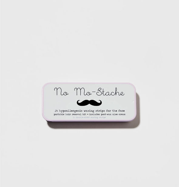 Rectangular No Mo-Stache wax strips tin with black lettering and mustache graphic