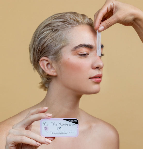 Models demonstrate use of the No Mo-Unibrow wax strips